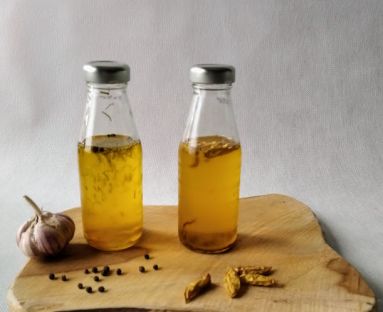 Oleje smakowe - czosnkowo-ziołowy i pikantny