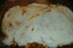 płaty makaronu lasagne- mięso z sosem-ser Mozzarella-sos beszamelowy-makaron lasagne-mięso z sosem pomidorowym-sos beszamelowy